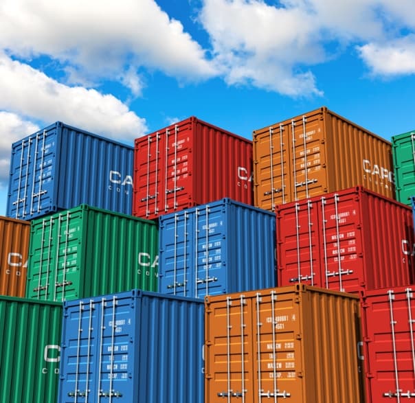 Blue skies with stacks and stacks of multi colored shipping containers